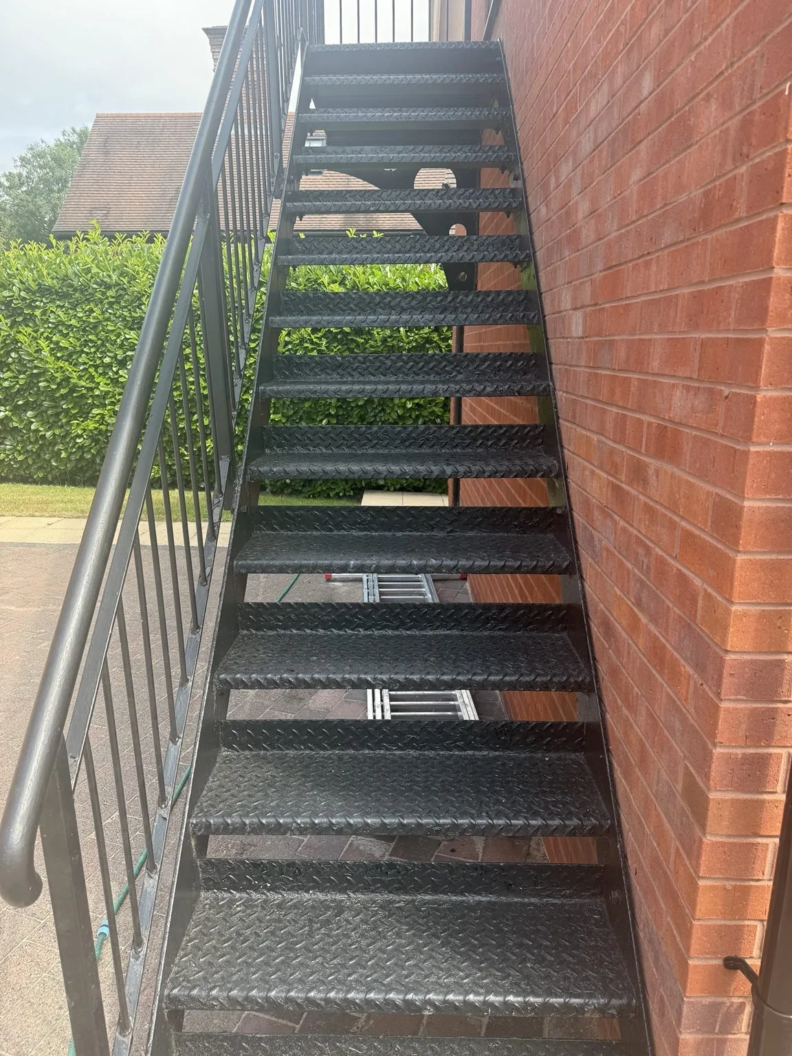 Completed exterior metal staircase painting