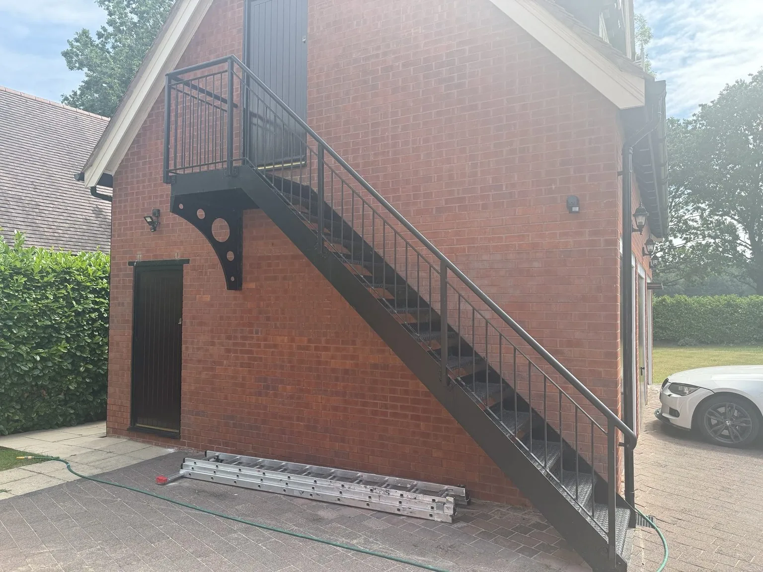 Completed exterior metal staircase repaint in Cheshire