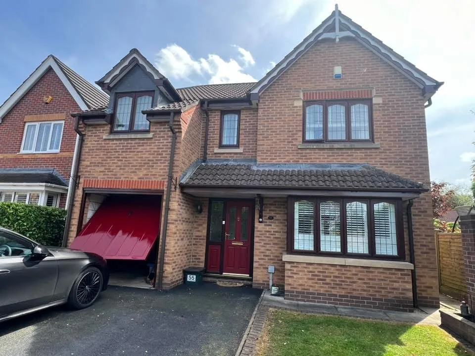 House exterior with red painted features