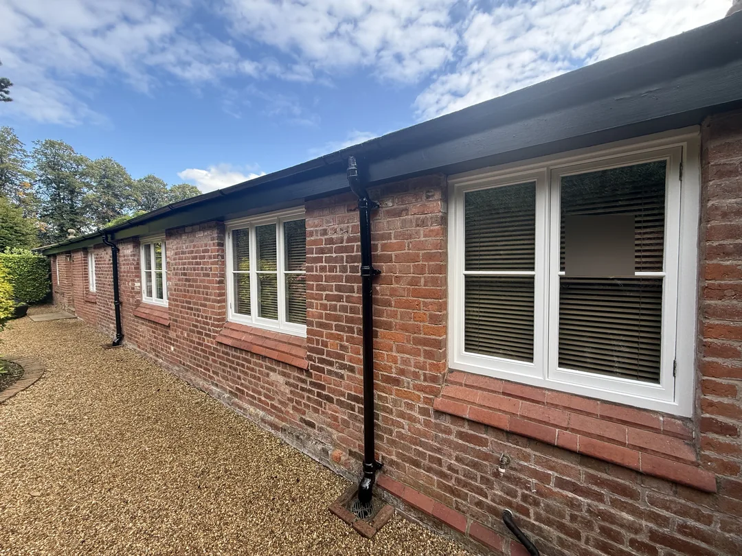 White window frames and dark exterior trim at a private property in Bostock, near Middlewich.