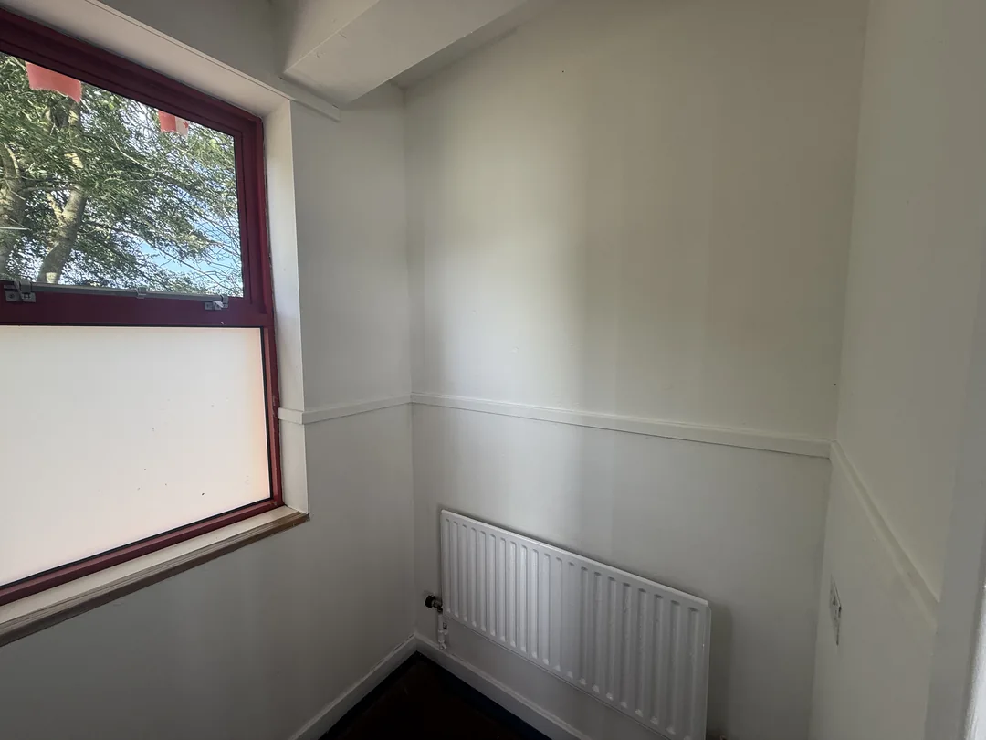 The same window corner with its refreshed wall finish.