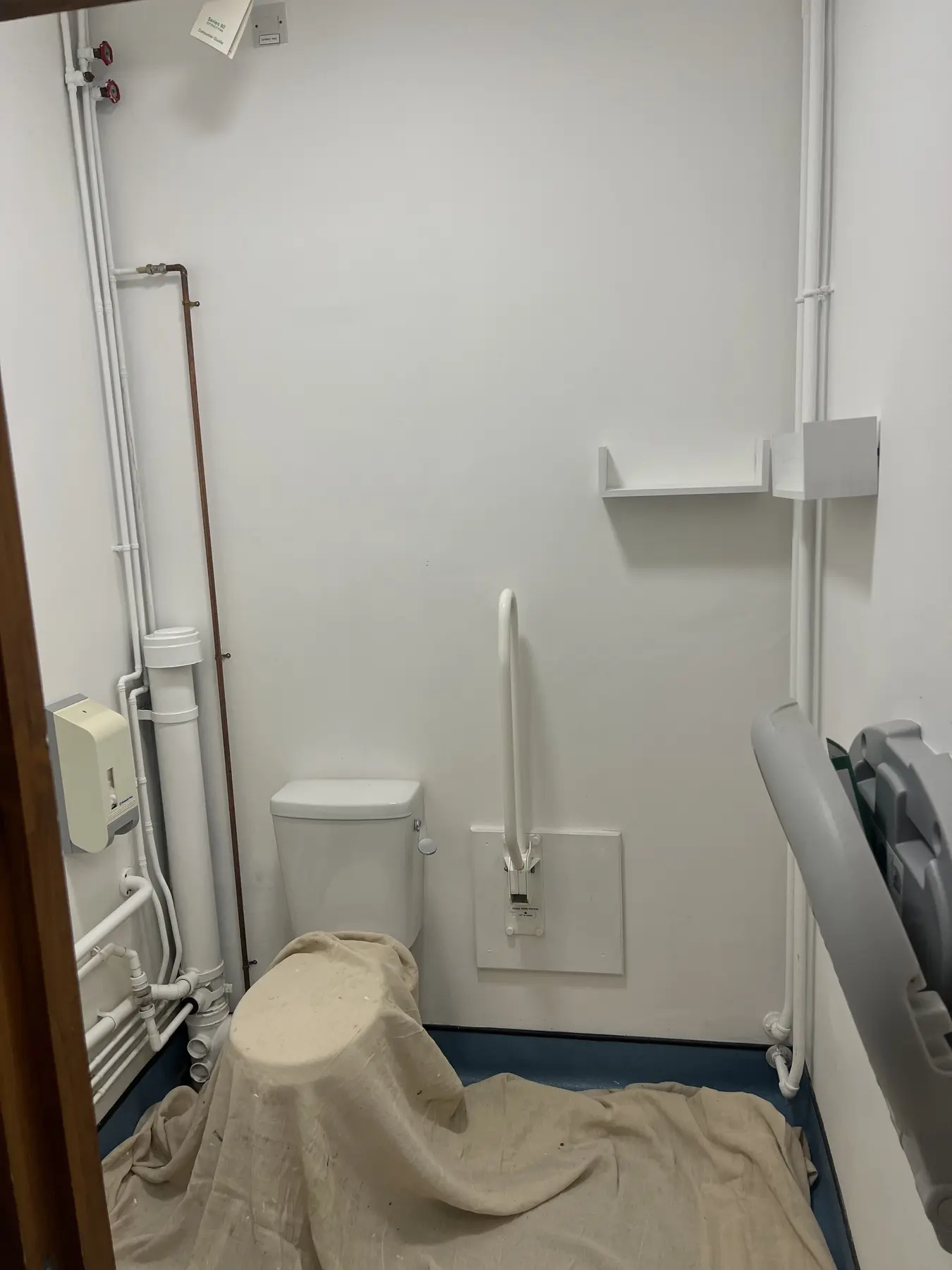 Darnhall school bathroom cubicle before decorating
