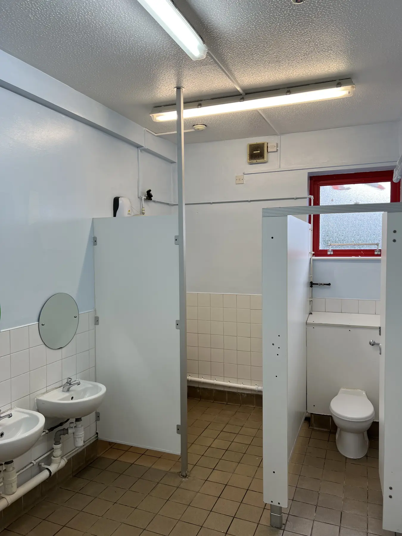 Darnhall school bathroom partitions after wall decorating