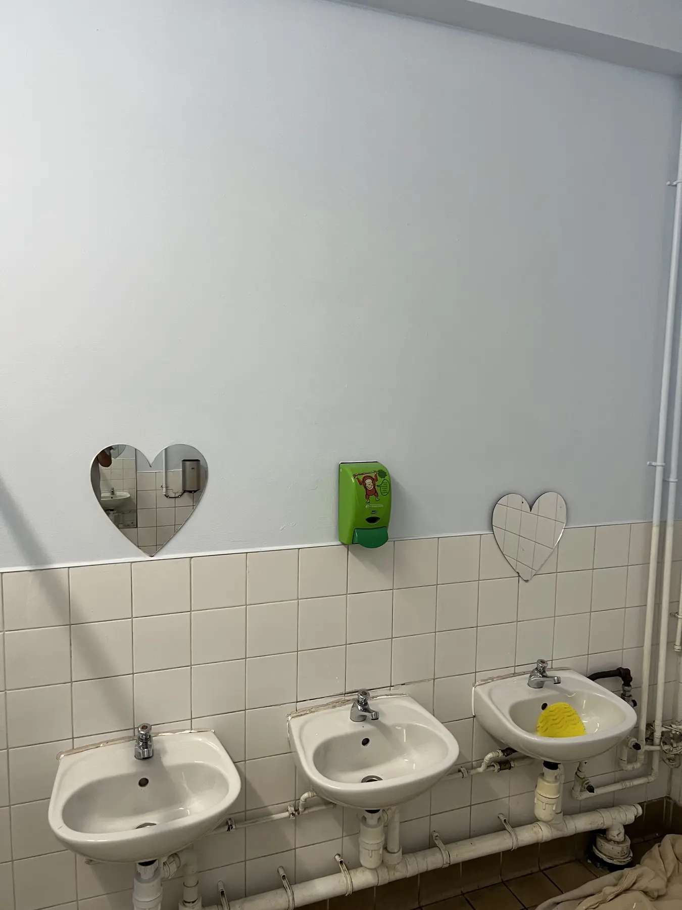Darnhall school washbasin wall after decorating