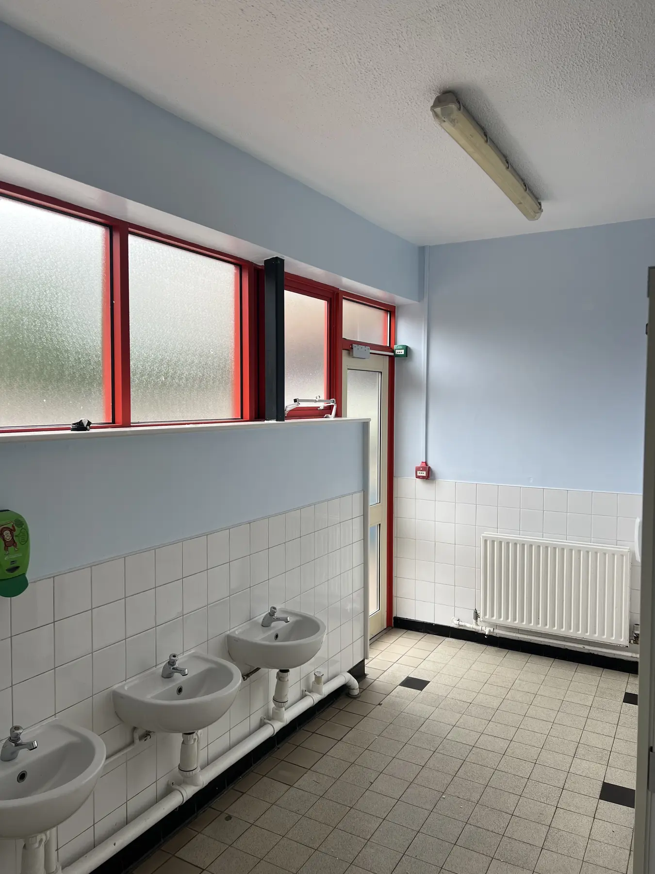Darnhall school washbasin wall before decorating
