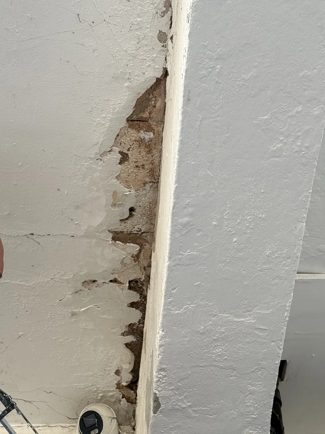 Canopy soffit joint before preparation and repair.