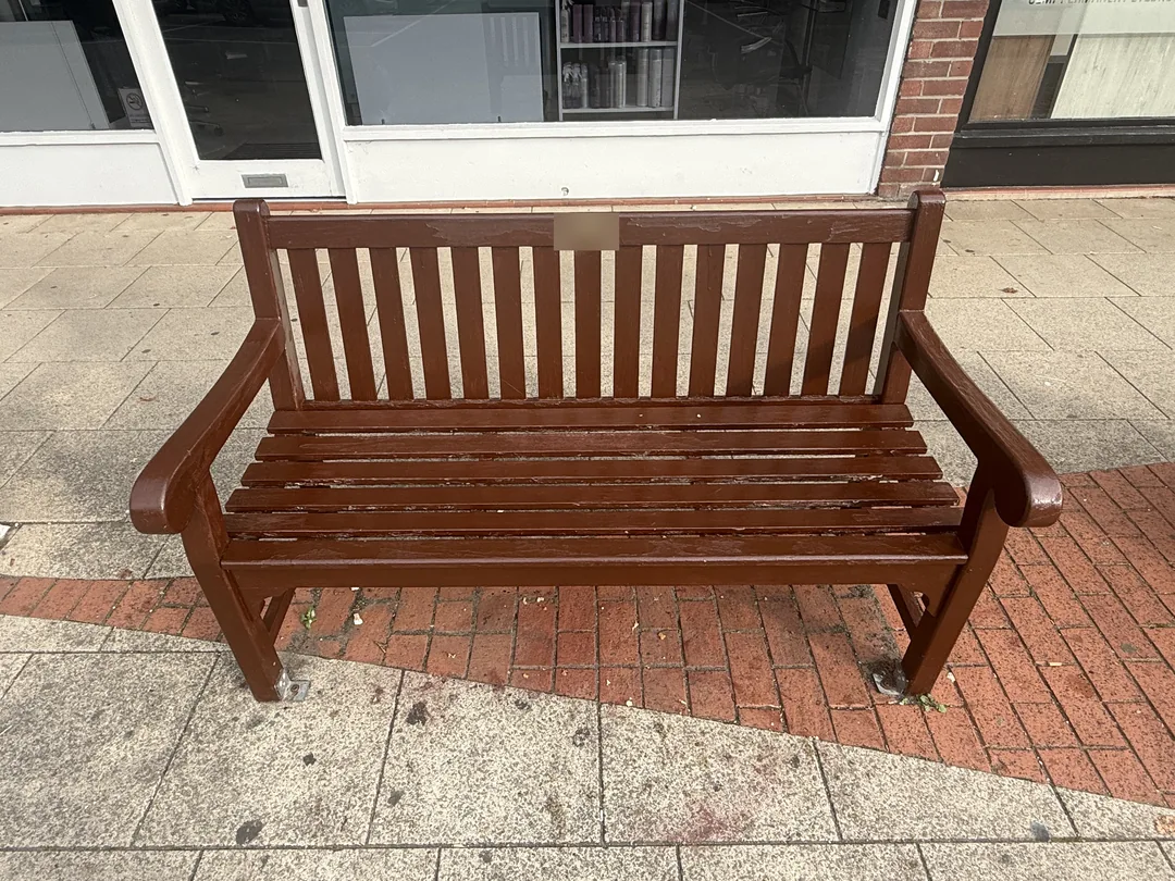 Third bench at the shopping precinct.
