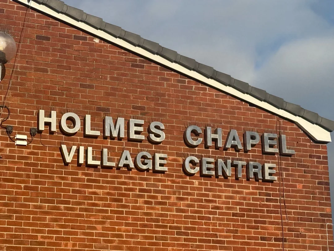 Closer view of the finished fascia above the Holmes Chapel Village Centre lettering.