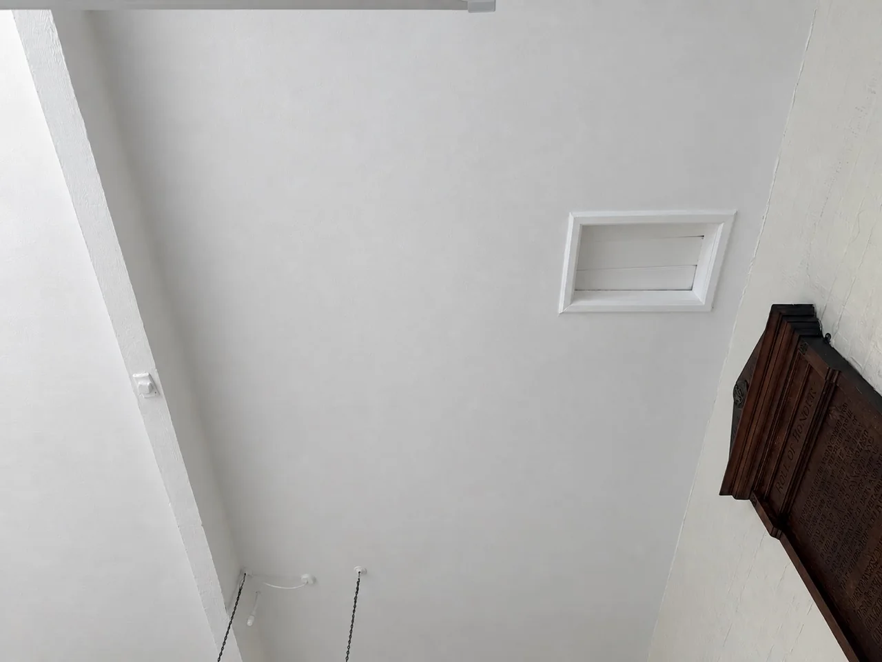 Completed white ceiling around the ventilation grille at the Nantwich school