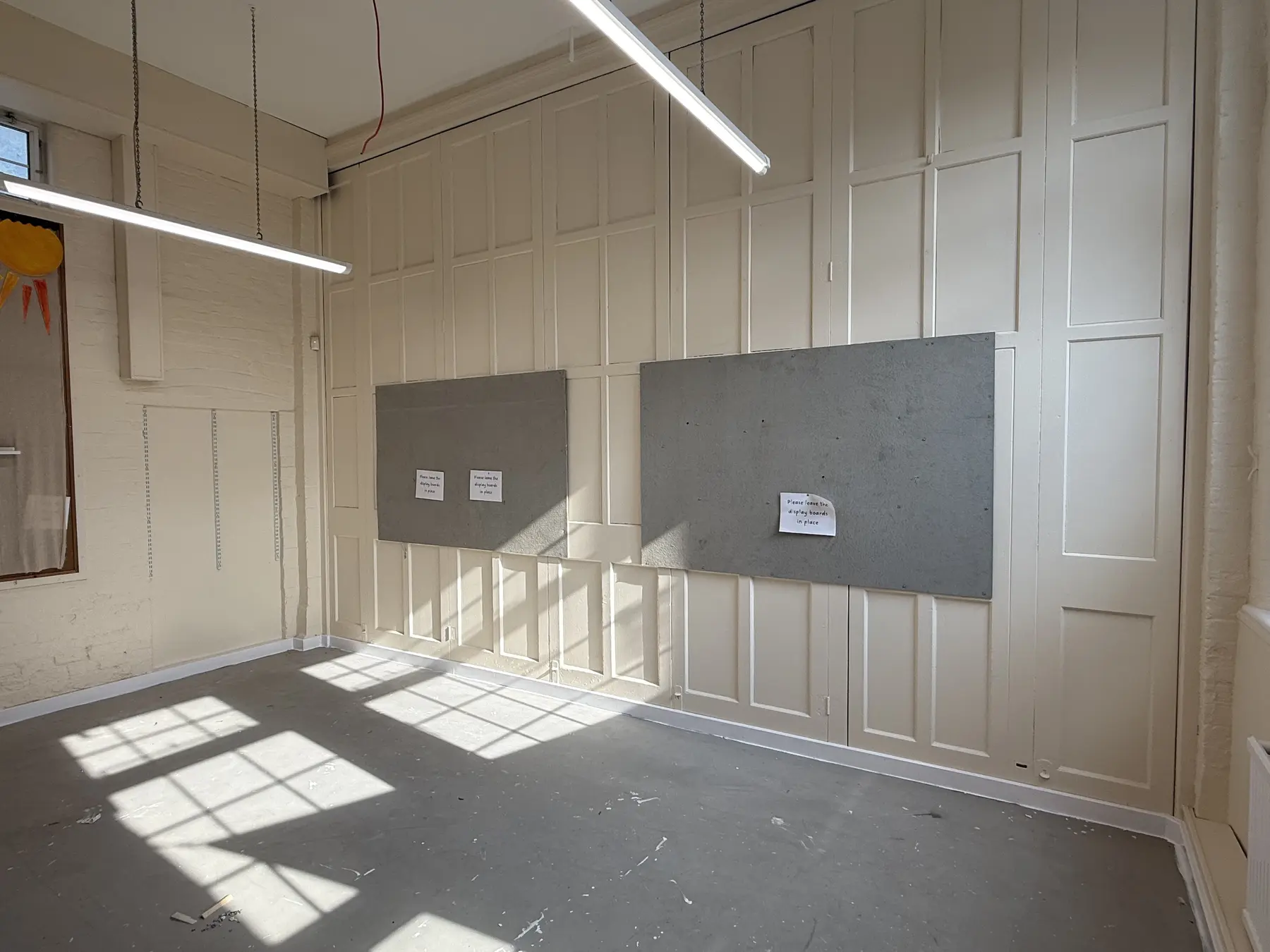 Panelled wall in classroom one after decorating