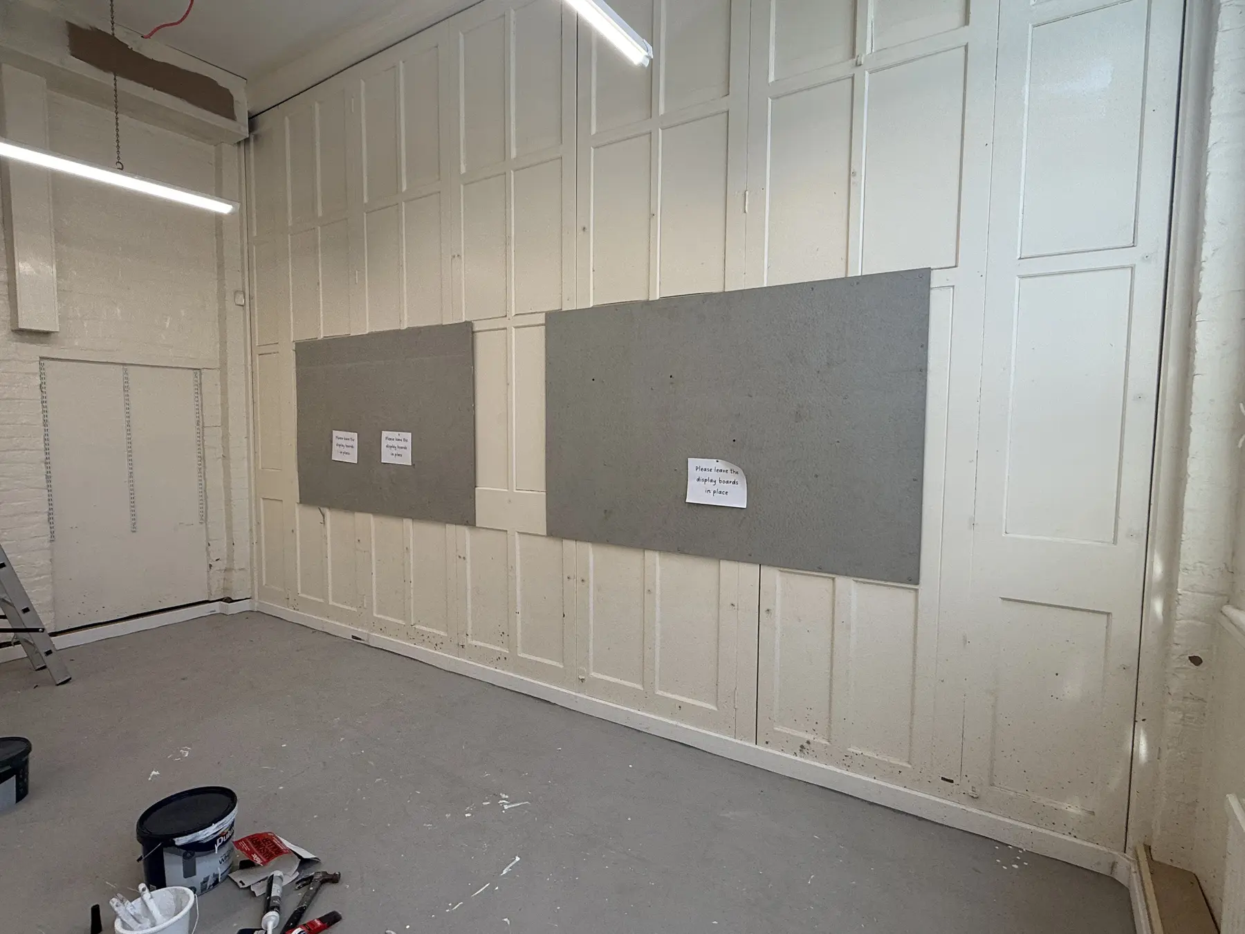 Panelled wall in classroom one before final decoration