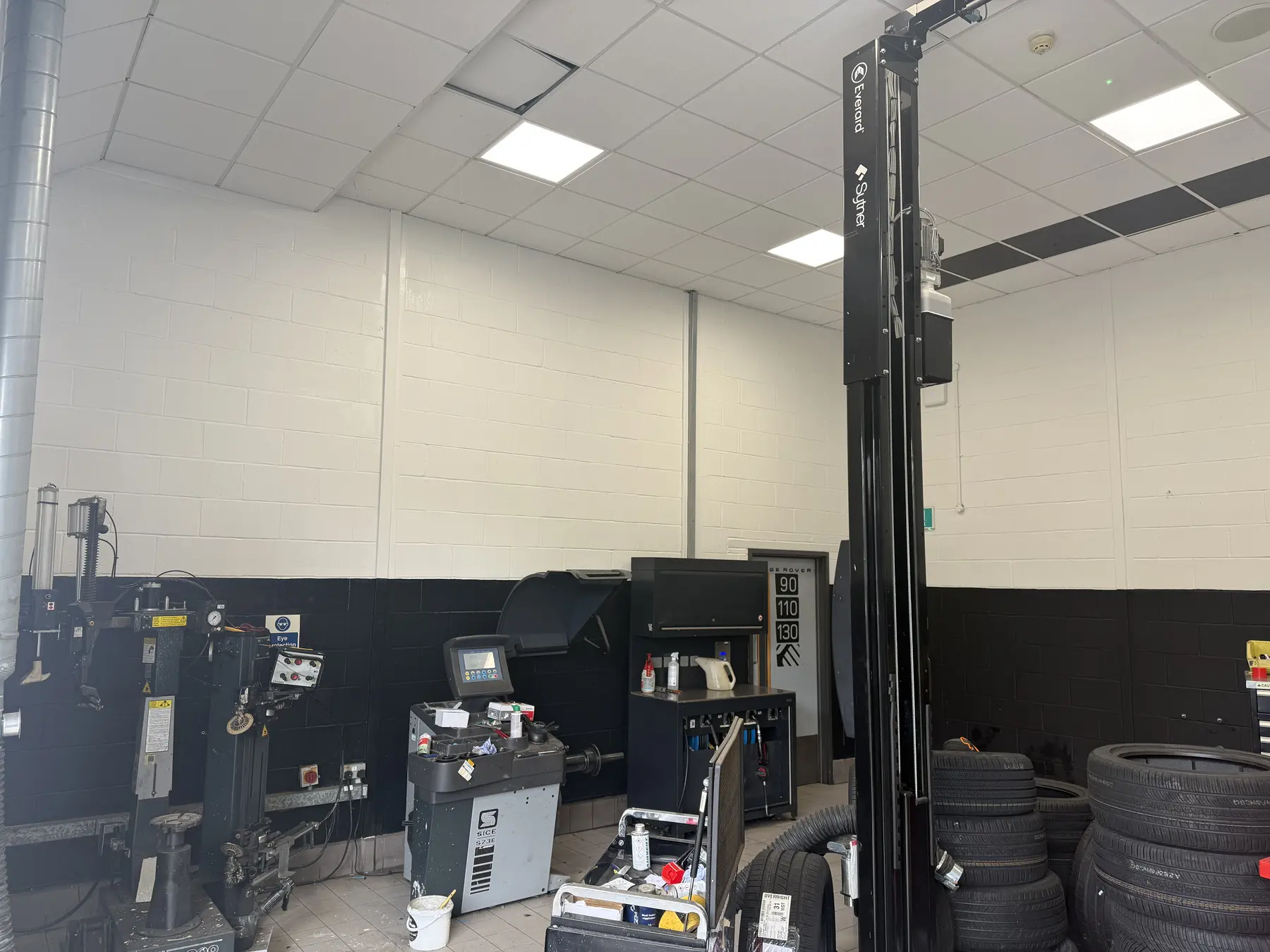 Finished side wall in Range Rover workshop bay one