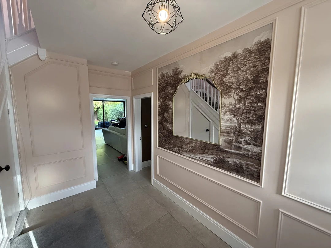 Completed hallway in Sale with painted beading and a scenic wallpaper feature.