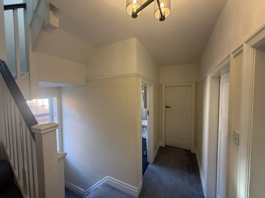 The landing walls and doorways before fitting the decorative beading.