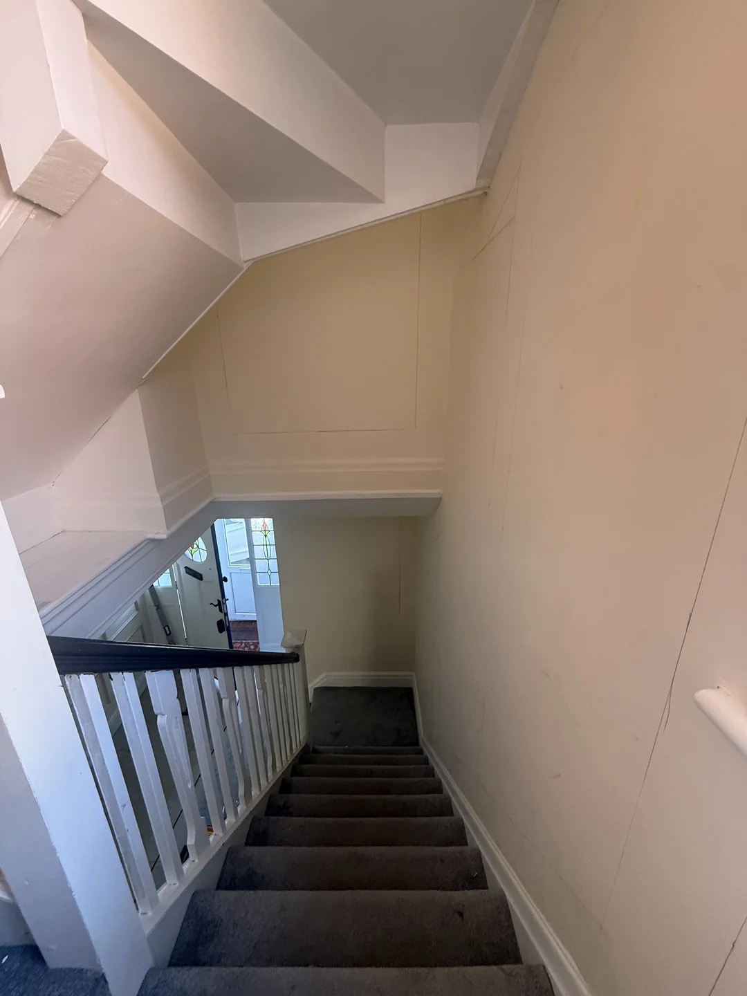 Earlier view down the stairwell, before the decorative beading was fitted.