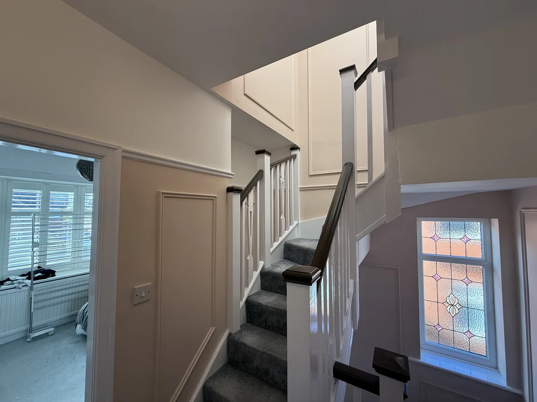 The decorated landing and stair section with the wall beading in place.