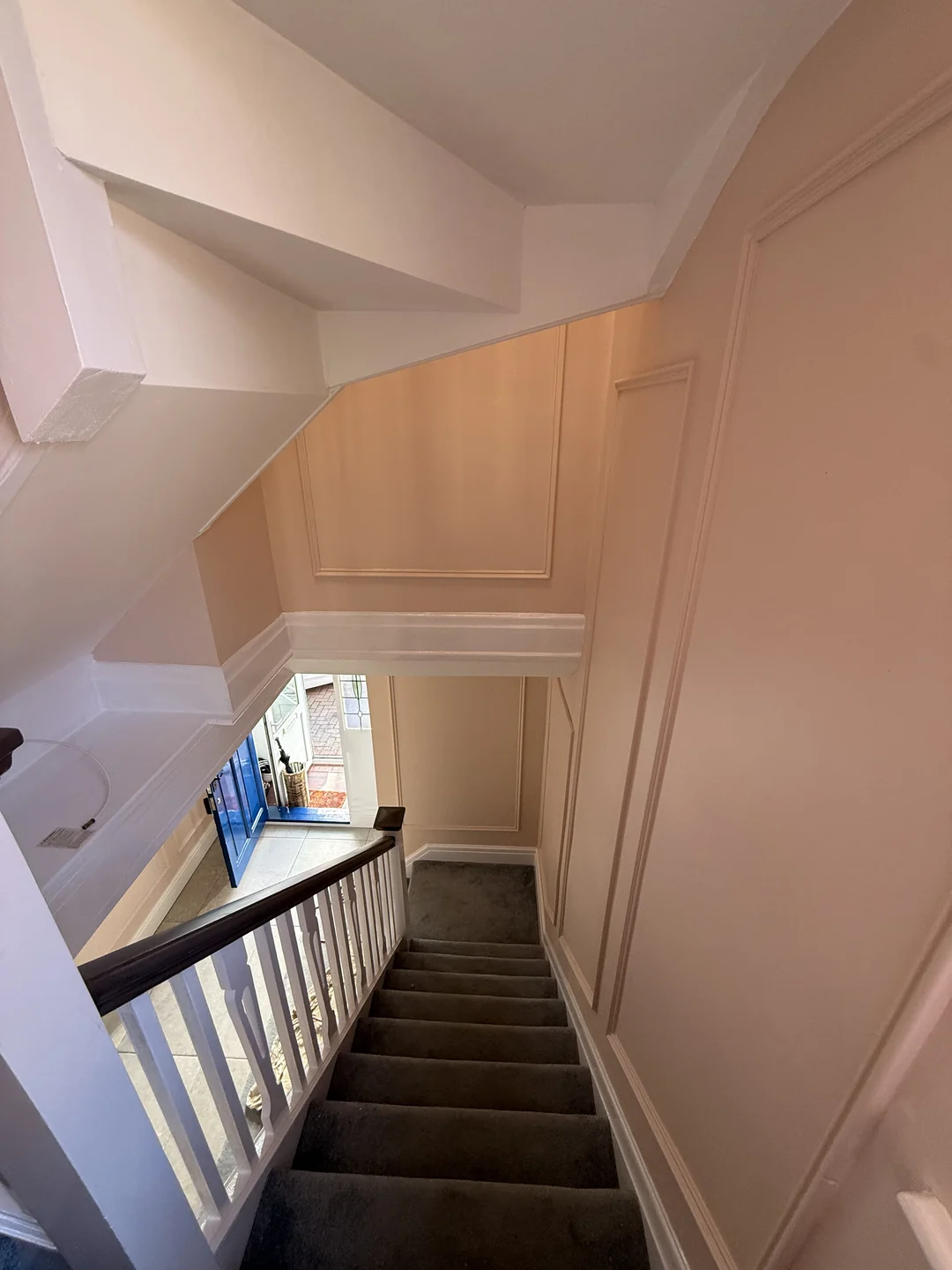 The same stairwell after fitting and decorating the wall beading.