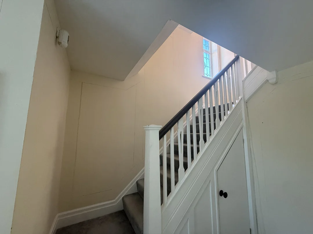 The staircase wall before the new beading and decorating.