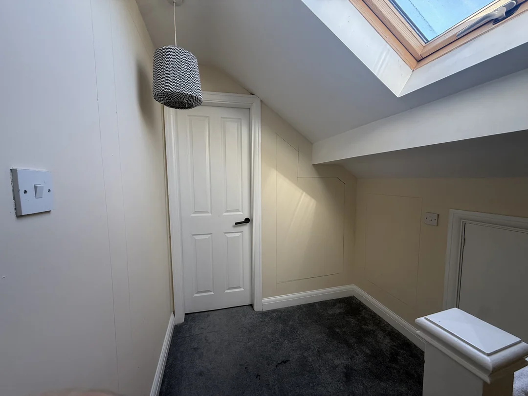 The upper landing walls, doorway and low access door before the new beading and decorating.