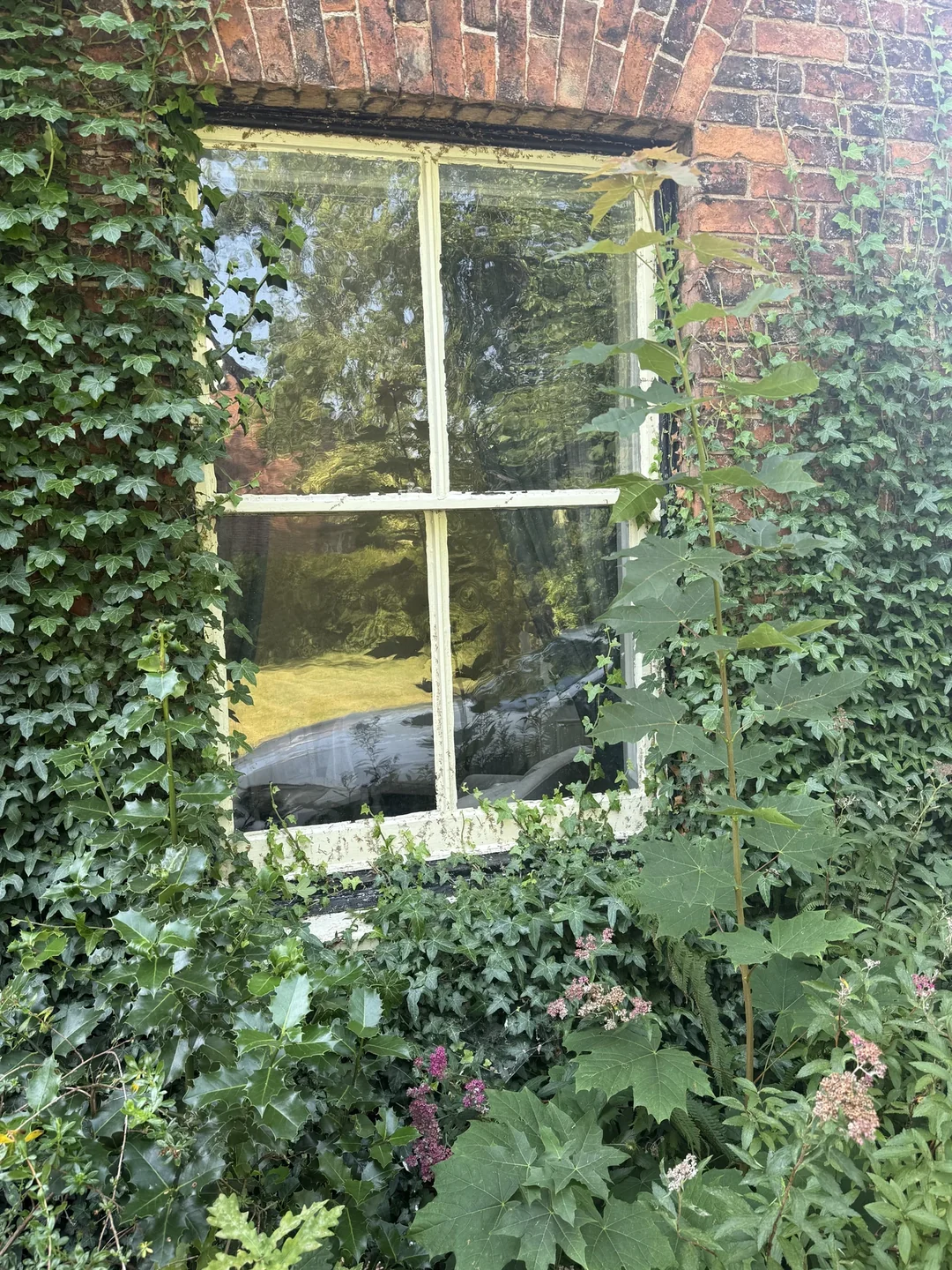 The weathered window and sill before redecoration.