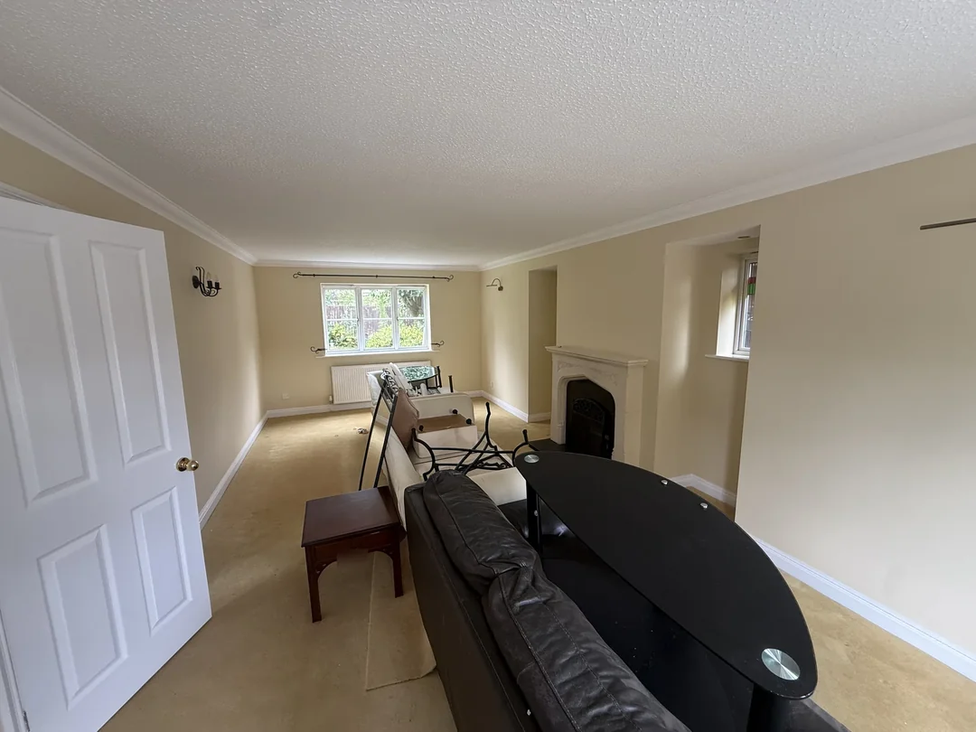 The same room after repainting, before the furniture was put back.