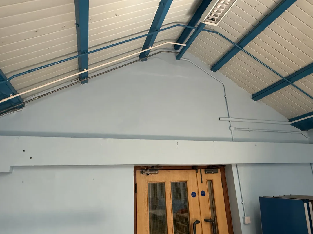 After decoration: the hall end wall.