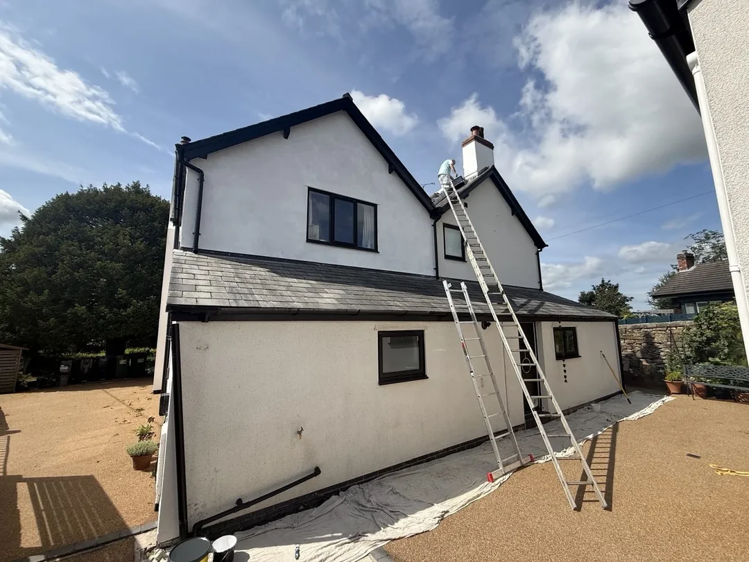 Exterior decorating preparation with access ladders in place