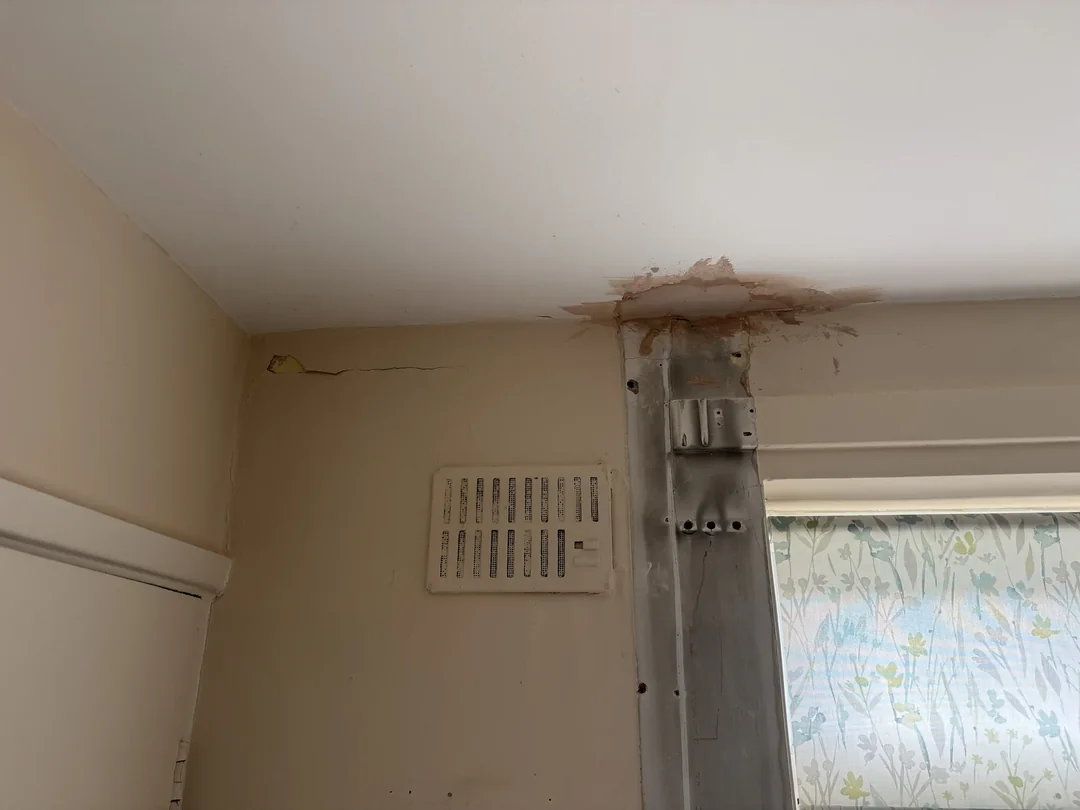 During preparation: exposed and repaired areas around the kitchen walls.