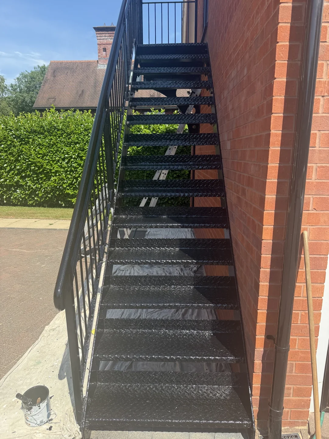 The treads and handrail with their fresh black finish.
